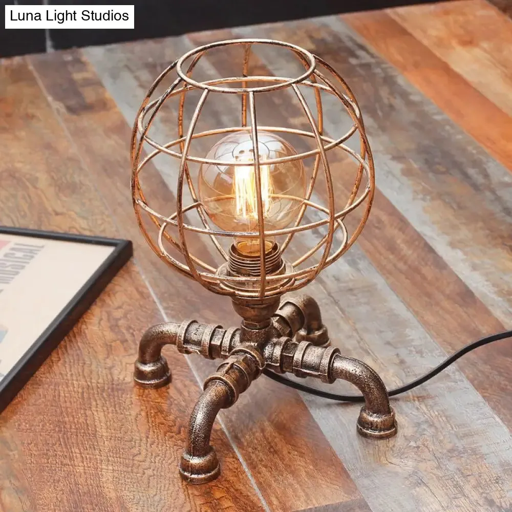 Metal Ball Cage Table Lamp with Pipe-Like Base - Industrial Style Mini Table Light, Antique Bronze Finish, 1 Bulb - Ideal for Bedroom