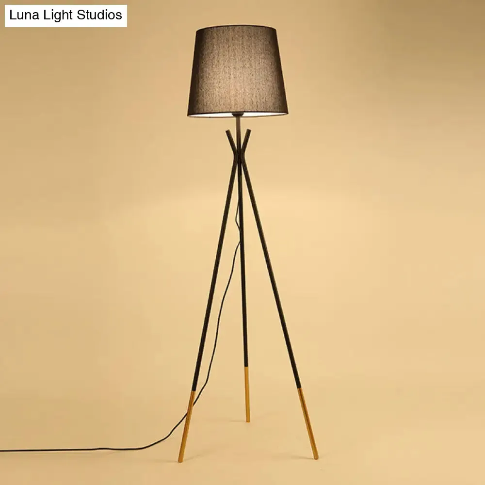 Minimalist Black/White Tapered Floor Lamp with Brass Accents