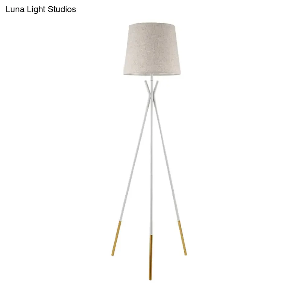 Minimalist Black/White Tapered Floor Lamp with Brass Accents